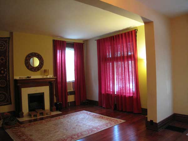 Front room, looking in from the foyer. A knee wall (or higher) and some columns are, I think called for.