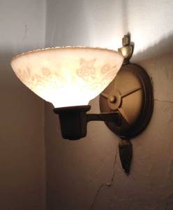 100 percent gen-u-ine plastic (though to be fair the glass shade isn't bad...and I get out of fixing the plaster until I find the right fixture).