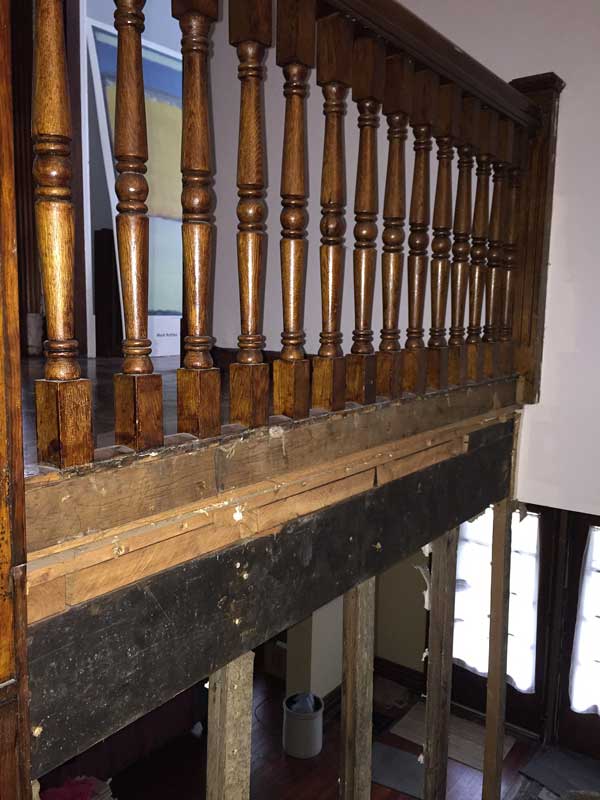 This railing should be back about 5', aligned with the doorway.