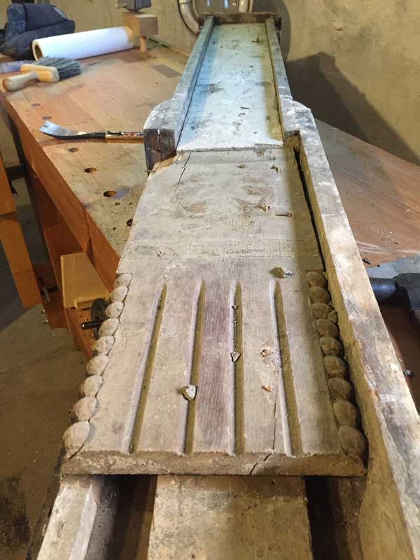 Yes, inside the halves of the newel post are parts of another newel post. Not salvageable.